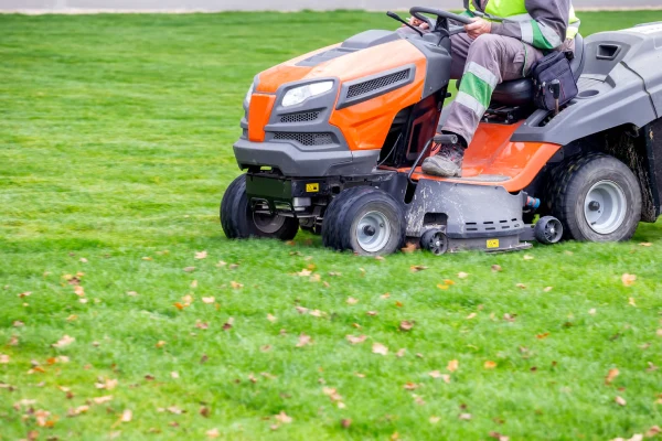Professional Lawn Mower In Motion, Cutting The Lawn